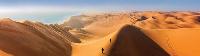 Climbing the sand dunes of Sossusvlei -  Photo: Peter Walton